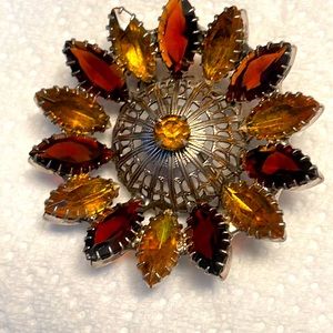 High end, vintage, Amber and brown burgundy domed brooch